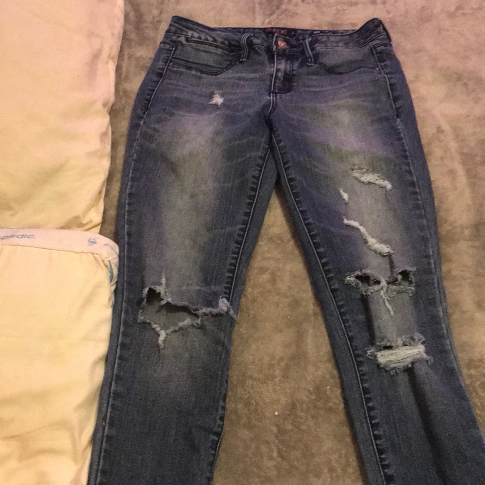 Blue rip jeans can’t fit me anymore